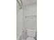 Clean bathroom featuring white tile, a shower, and a standard toilet at 68 La Rue Nw Pl, Atlanta, GA 30327