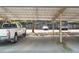 Carport offering covered parking for multiple vehicles at 68 La Rue Nw Pl, Atlanta, GA 30327