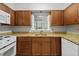 Kitchen featuring granite countertops, stainless steel appliances, and ample cabinet space at 68 La Rue Nw Pl, Atlanta, GA 30327