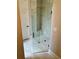 Stylish bathroom with glass shower, elegant tile work, and modern fixtures at 7220 Winderlea Ln, Cumming, GA 30040