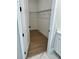 Walk-in closet features wood floors and wire shelving at 7220 Winderlea Ln, Cumming, GA 30040