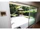 View of the backyard from inside, featuring a gazebo at 742 Starlight Ne Ct, Sandy Springs, GA 30342