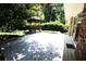 Outdoor deck with gazebo overlooking lush greenery offers a serene retreat at 742 Starlight Ne Ct, Sandy Springs, GA 30342