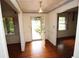 Inviting foyer with hardwood floors, decorative trim, and a glass-paneled front door at 742 Starlight Ne Ct, Sandy Springs, GA 30342