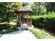 Gazebo in a landscaped backyard, surrounded by lush greenery at 742 Starlight Ne Ct, Sandy Springs, GA 30342
