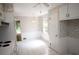 Eat-in kitchen with white tiled floor and natural light streaming through window at 742 Starlight Ne Ct, Sandy Springs, GA 30342