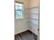 Walk-in closet with window and wire shelving for optimal storage and organization at 109 Bandimere Pkwy, Dallas, GA 30157