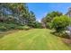 A large lawn offers privacy and recreational space at 4345 Mantle Ridge Dr, Cumming, GA 30041