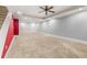 Finished basement with new carpet, recessed lights and neutral colors at 4345 Mantle Ridge Dr, Cumming, GA 30041
