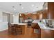 Well-equipped kitchen featuring an island with barstool seating and stainless steel appliances at 506 Spring View Dr, Woodstock, GA 30188