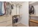 Walk-in closet with custom shelving and drawers to keep everything organized at 506 Spring View Dr, Woodstock, GA 30188