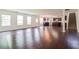 Open concept basement with island kitchen, fireplace, and staircase at 5900 Fairington Farms Lane Ln, Stonecrest, GA 30038