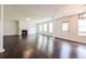 Finished basement with a fireplace, dark wood-like floors, and natural light at 5900 Fairington Farms Lane Ln, Stonecrest, GA 30038