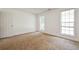 Bedroom features natural light from two windows at 5900 Fairington Farms Lane Ln, Stonecrest, GA 30038