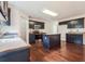 Bright kitchen with dark cabinets, stainless appliances, and central island at 5900 Fairington Farms Lane Ln, Stonecrest, GA 30038