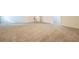 Spacious living area with neutral carpet and white walls, offering a versatile and bright living space at 5900 Fairington Farms Lane Ln, Stonecrest, GA 30038
