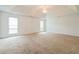 Generous main bedroom with tray ceiling and chandelier lighting fixture at 5900 Fairington Farms Lane Ln, Stonecrest, GA 30038