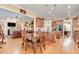 Spacious open-concept kitchen and living room with hardwood floors and stainless steel appliances at 8095 Georgetown Cir, Suwanee, GA 30024