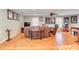 Spacious living room with hardwood floors and neutral paint at 8095 Georgetown Cir, Suwanee, GA 30024