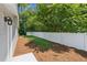 Backyard featuring green grass and an inviting privacy fence at 1480 Bettis Tribble Gap Rd, Cumming, GA 30040