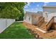 Spacious backyard area with new landscaping and a privacy fence at 1480 Bettis Tribble Gap Rd, Cumming, GA 30040