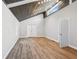 Open living area with vaulted ceiling, natural wood accents, and ample natural light at 1480 Bettis Tribble Gap Rd, Cumming, GA 30040