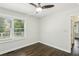 Bright bedroom with hardwood floors and ceiling fan at 1617 Columbia Cir, Decatur, GA 30032
