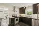 Well-lit kitchen features stainless steel appliances and granite countertops at 1617 Columbia Cir, Decatur, GA 30032