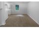Open-concept dining area with natural light, adjacent to the kitchen, perfect for Gathering meals at 230 Myrtle Grove Ln, Covington, GA 30014