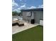 Outdoor deck area with gray composite tiles, heaters and outdoor lounge furniture at 2424 Memorial Drive Se Dr # 3, Atlanta, GA 30317