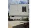 Back exterior showcasing painted brick, white siding, and modern design at 2424 Memorial Drive Se Dr # 3, Atlanta, GA 30317