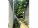 Exterior home side view, landscaping, pathway and hardscape retaining wall at 2424 Memorial Drive Se Dr # 3, Atlanta, GA 30317
