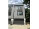 Modern townhouse with gray siding and a large garage door, providing convenient parking at 2424 Memorial Drive Se Dr # 7, Atlanta, GA 30317