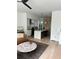 Open-concept layout showcases the living room flowing seamlessly into the modern kitchen area at 2424 Memorial Drive Se Dr # 7, Atlanta, GA 30317