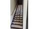 Contemporary staircase design with sleek lines and modern lighting, enhancing the home's interior at 2424 Memorial Drive Se Dr # 7, Atlanta, GA 30317