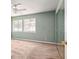 Bright bedroom with ample natural light, ceiling fan, and a mirrored closet for extra space and storage at 4266 Roswell Ne Rd # H4, Atlanta, GA 30342