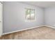Bedroom featuring neutral walls and carpet with a window offering natural light at 4266 Roswell Ne Rd # H4, Atlanta, GA 30342