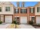 Charming brick townhome with attached garage and well-manicured landscaping at 786 Brookside Parc Ln, Avondale Estates, GA 30002