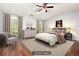 Spacious primary bedroom with natural light and wood flooring at 786 Brookside Parc Ln, Avondale Estates, GA 30002