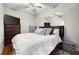 Cozy bedroom with a ceiling fan, dresser and mirrored closet creating extra space at 1029 Piedmont Ne Ave # 202, Atlanta, GA 30309