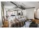 Stylish living room showcasing modern decor, open layout, and industrial-chic exposed ductwork and hardwood flooring at 1029 Piedmont Ne Ave # 202, Atlanta, GA 30309