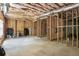 Unfinished basement with exposed ceiling insulation and wooden framing at 126 Woodbury Ln, Canton, GA 30114