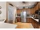 Kitchen boasting stainless steel appliances and wooden cabinets at 126 Woodbury Ln, Canton, GA 30114