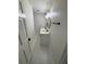 Stylish bathroom with double sinks, hexagon tile flooring, modern fixtures, and sleek, white finishes at 1789 Springhouse Ct, Lawrenceville, GA 30043