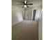 Neutral bedroom with carpet, a ceiling fan, and a closet at 1789 Springhouse Ct, Lawrenceville, GA 30043