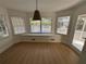 Sun-drenched breakfast nook with bay window, seat, and access to porch/patio at 1789 Springhouse Ct, Lawrenceville, GA 30043