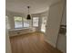 Bright breakfast nook with bay window, seat, and access to porch/patio at 1789 Springhouse Ct, Lawrenceville, GA 30043