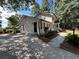 Exterior view of a two story home with a concrete driveway, and landscaped front yard at 1789 Springhouse Ct, Lawrenceville, GA 30043