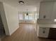 Kitchen view looking into dining nook with lots of windows and natural light at 1789 Springhouse Ct, Lawrenceville, GA 30043