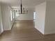 Open-concept living space with new lighting and flooring, freshly painted walls, and abundant natural light at 1789 Springhouse Ct, Lawrenceville, GA 30043